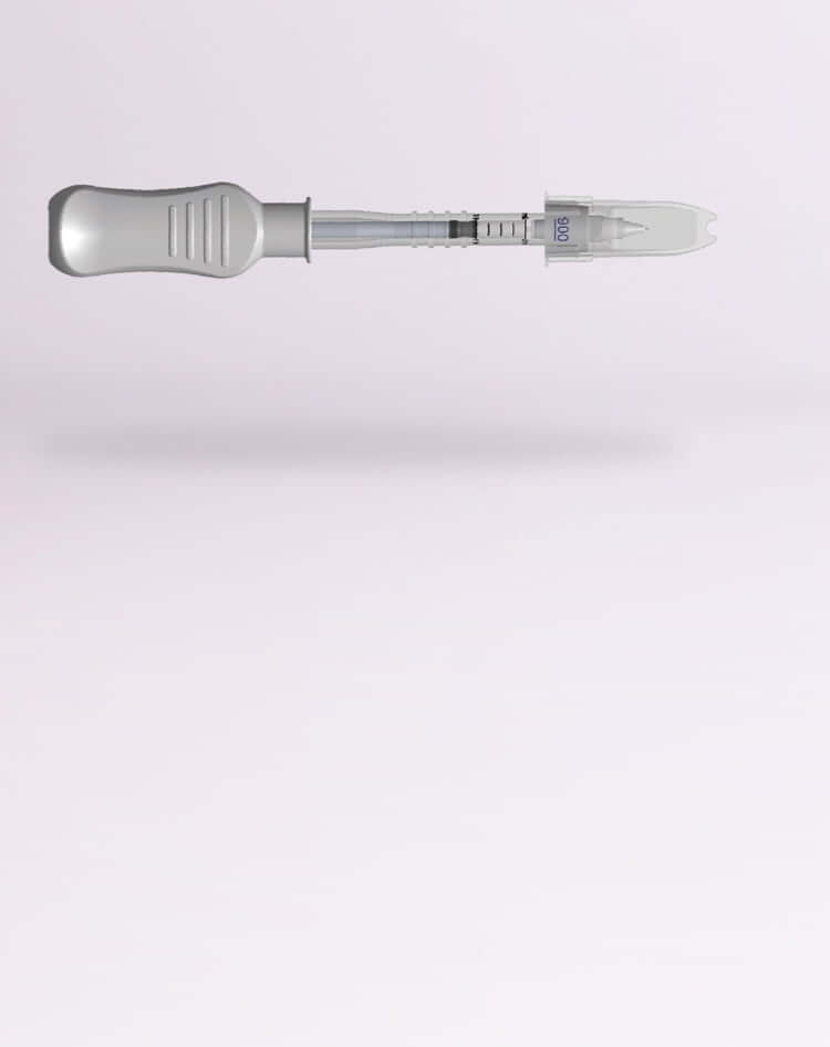The SCS Microinjector® is resting on a clean surface with the cap protecting the needle.