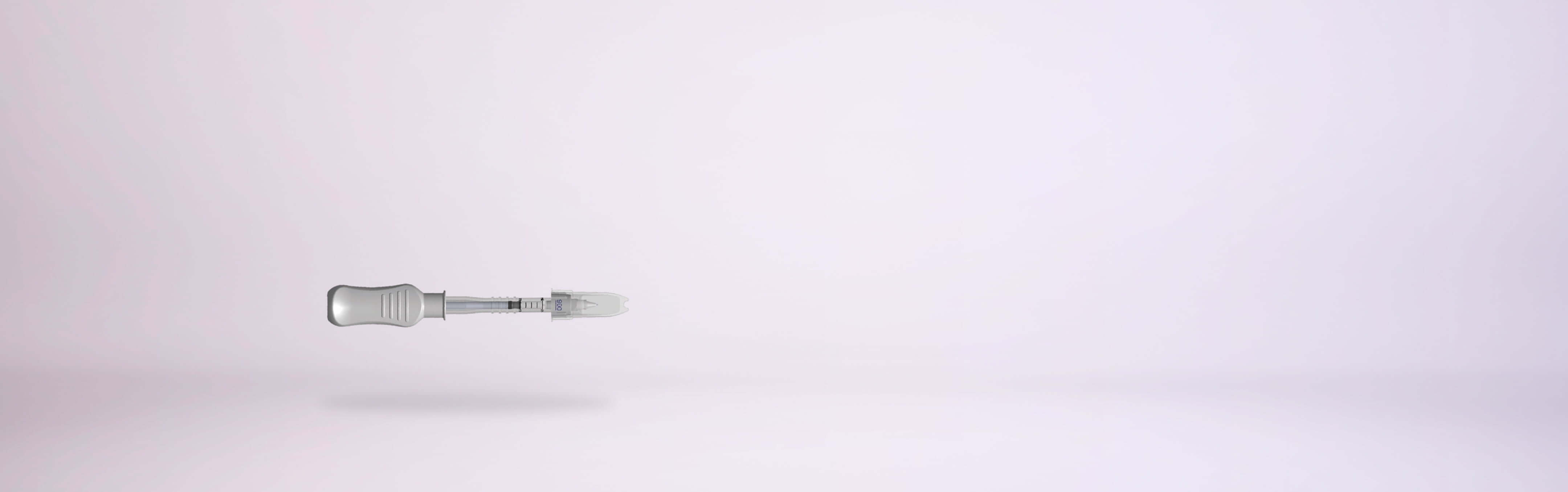 The SCS Microinjector® is resting on a clean surface with the cap protecting the needle.